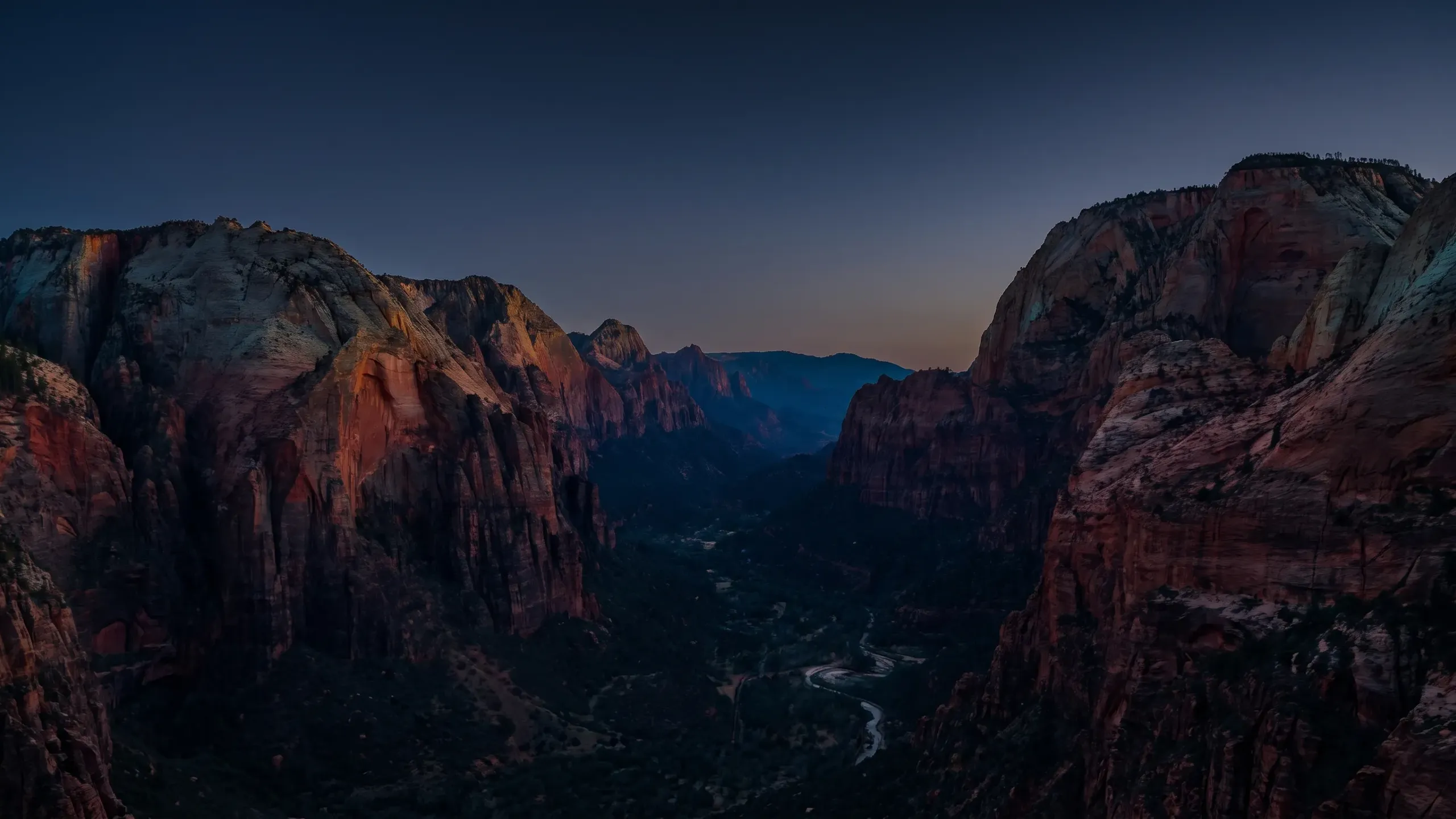 Red sandstone canyon walls in Southern Utah at twilight