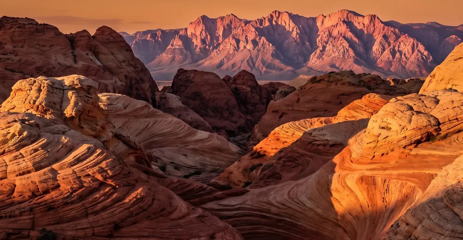 Red rock canyon cliffs and distant mesa in Southern Utah